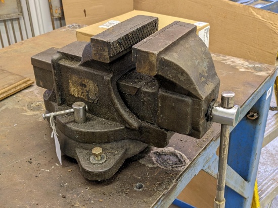 Industrial duty swiveling bench vise with 6-1/4" jaws. Moves smoothly, nice vise. Jaws look pretty