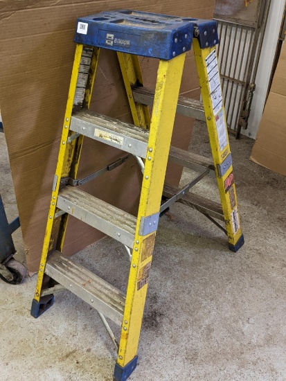 Bauer heavy construction double side step ladder is about 45" tall when set up. Small crack noted on