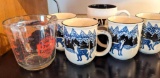 2 cup Anchor Hocking measure cup, Caterpillar mug, and a set of 4 Northwoods style wolf mugs. Very