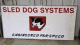 Sled Dog Systems sign is about 65