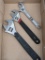 Three adjustable wrenches, largest measures 12
