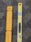 Stanley 4' level w/ good vials and windows, and a hard plastic case.