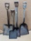 Two grain shovels, and two smaller flat edge shovels. All have tight handles.