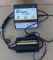 Schumacher 200 watt power inverter is currently hooked up to a Rotunda door latch cleaner is model
