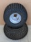 Two Carlisle ATV or ATC tires. Tires are AT22X11-8. Rims have a 4x4 pattern w/ a 2-3/4