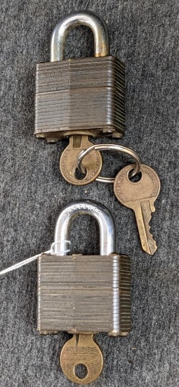 Pair of No. 4 brass Marine padlocks by Master Lock are keyed alike. About 2-1/4" long.