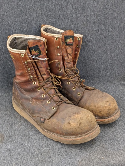 Pair of waterproof Thorogood safety toe men's work boots in size 13 2E. Still have some life left.