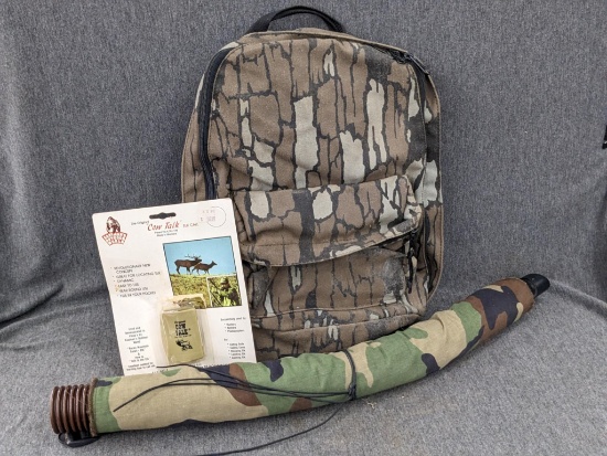 Wayne Carlton's 26" call or similar, Cow Talk elk call, and a 14" camouflage backpack. Cow Talk is