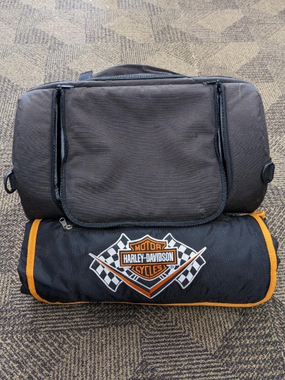Harley-Davidson 16" wide seat wide saddle bag, and what we believe to be a 62" long soft motorcycle