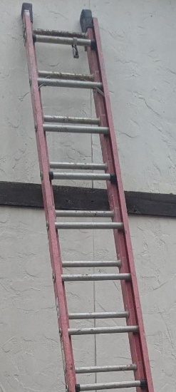 24' long extension ladder that has a 21' high working length, the ladder is in overall good
