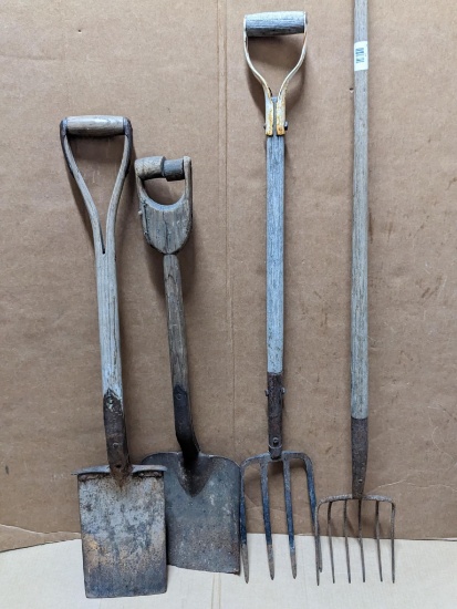 Potato fork, pitch fork, and two shovels, all the handles are tight, but one is cracked at the top.
