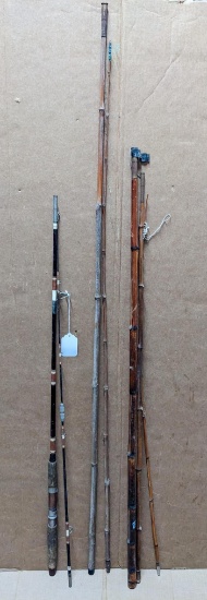 Two bamboo fishing rods, longest is 11' long and shorter is missing eye tip. Also includes a two