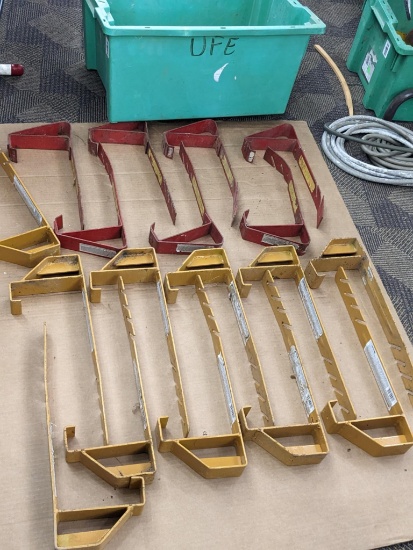 Sixteen roof jacks, orange ones appear to be heavier duty and measure to 18" long.