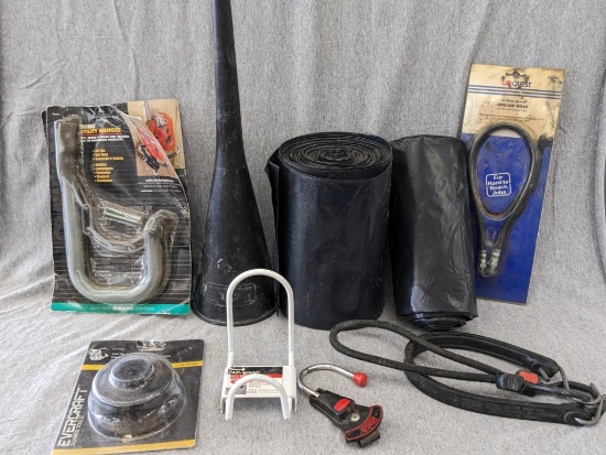 Contractor garbage bags, carquest grease hose, garage utility hangers, 18" funnel.