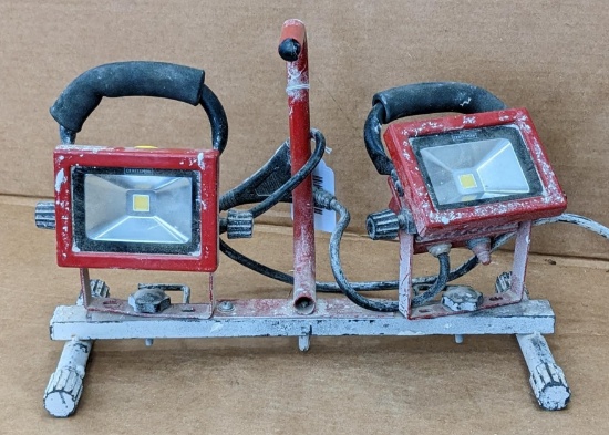 Craftsman model 17361 LED flood light set. Lights up. Has a chip missing from the plastic endcap on