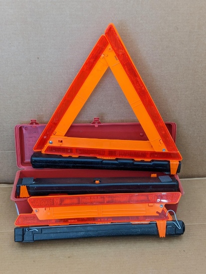Strato roadside flare set has three reflective collapsible triangles about 16" tall when set up.