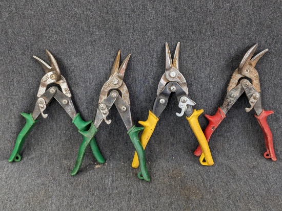 Four pairs of Wiss sheet metal/aviation shears, all in good functioning condition.