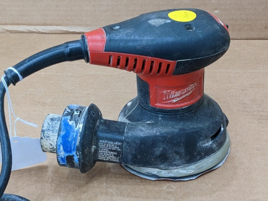 Milwaukee 5" random orbit sander no. 6021-21. The sander has variable speed, is in overall good