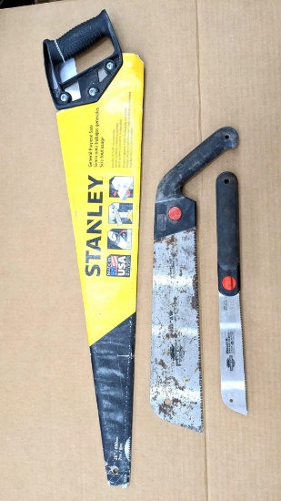 Two Sharksaw pull style saws, larger measures 18" overall, and a 29" Stanley general purpose cross