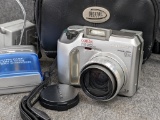 Vintage Olympus Camedia digital camera comes with 128mb and 16mb camera cards, case, manual, battery