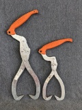 Two Husqvarna log tongs, larger opens to 12