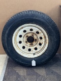 Tranmaster trailer tire w/ 5x5-1/2 bolt pattern, 3-1/4 center hub, and a 16