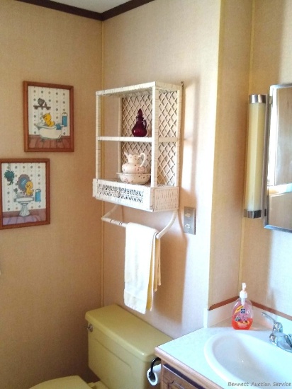 Everything in upstairs bathroom including wall hangings, bath linens, more as pictured.