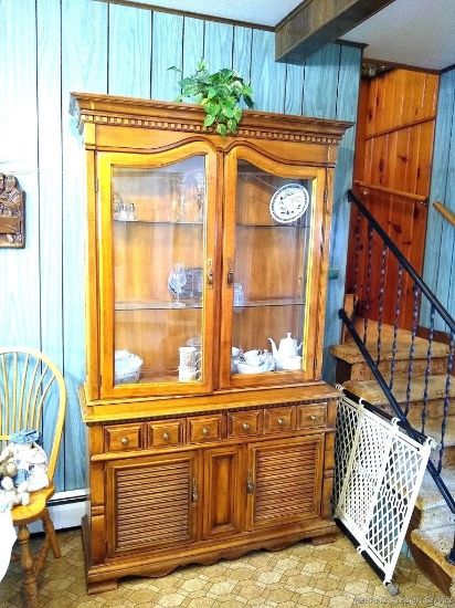 Everything in dining area including hutch, flatware, linens, china, wall hangings, wooden trash bin,