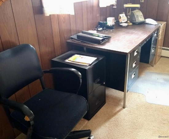 Everything in office including wall clock with oak cabinet, desk and rolling office chair, storage