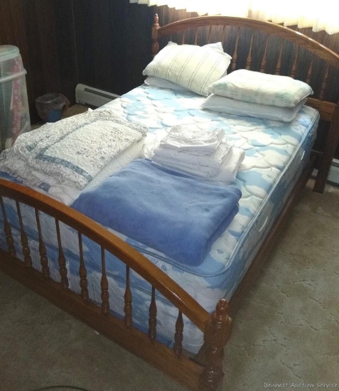 Everything in main floor master bedroom including nice bed with bedding - Seller thinks it's a queen