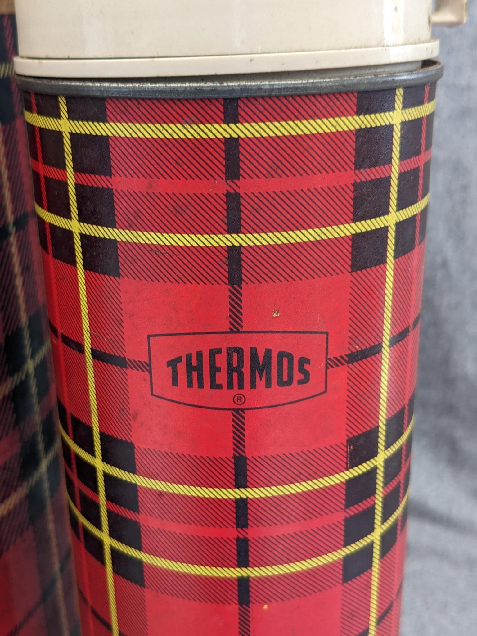 Vintage Thermos brand drink carrier and a