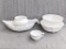 White glass pieces including footed vase, 14