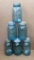 Six quart blue Ball canning jars with zinc lids.