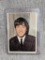 1964 Topps Beatles Color Card #1 Meet John Lennon Rookie Card. Card has paper glued in spots on the