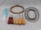 Embroidery hoops, latch hooks and thread; largest hoop measures 5