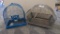 Two metal bird cages measure 15