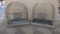 Two metal bird cages measure 15