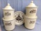Pfaltzgraff canister set and a complimentary clock body. Largest canister is 3-1/2 qt, a couple