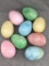 Nine colorful stone eggs up to approximately 3