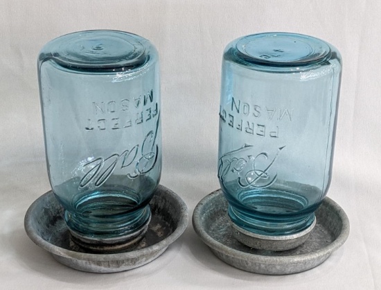 Set of 2 Ball Perfect Mason blue quart jars with galvanized water dishes; each measures 7-1/2" tall.