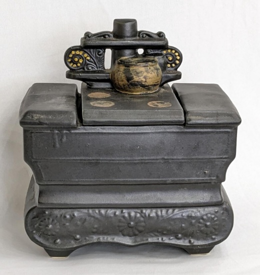 McCoy cookie jar shaped like an old wooden stove; measures 9" x 6" x 9" tall.