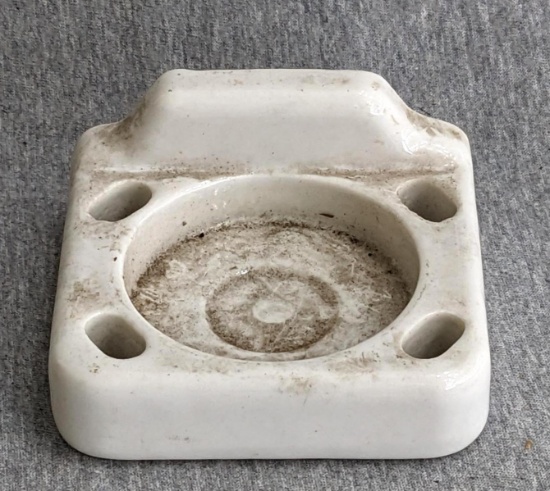 Ceramic wall mounted cup and toothbrush holder; measures 3-1/2" x 3-1/2".