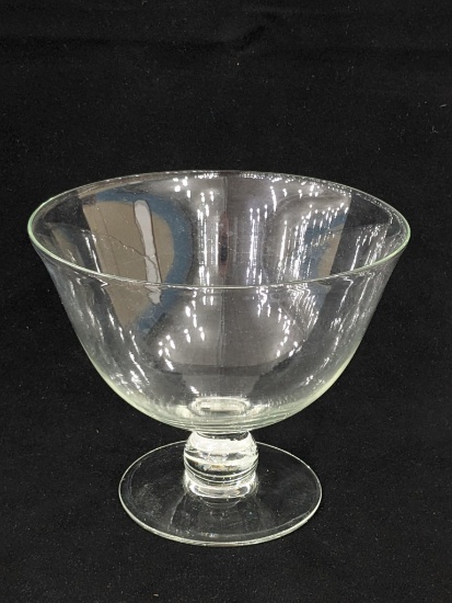 Pretty footed bowl would make a great fruit bowl. Stands 7-1/2" tall and is about 9" wide. No chips