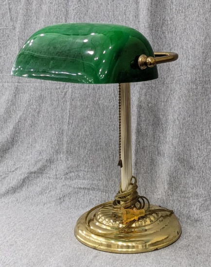 Banker style desk lamp with the classic green shade. In good condition, works and stands 14" tall.