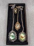 Eye catching cameo ring and three interesting necklaces with pendants up to 2-1/4