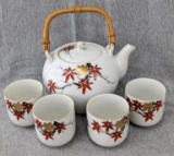 Cute little Japanese teapot with 4 matching cups; teapot measures 5-1/2