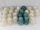 25 Various insulators include blue and clear glass. Largest is 4