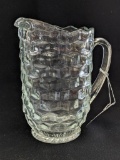 Cubic block pattern pitcher stands about 8
