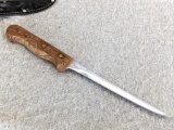 Stainless steel fillet knife with a very nice handle and a nice weather proof sheath. the knife is