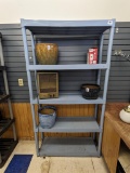 Sturdy plastic shelving unit measures 73